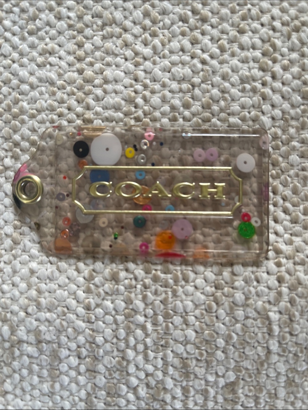 Coach Clear Sequin Confetti Tag with Gold Logo
